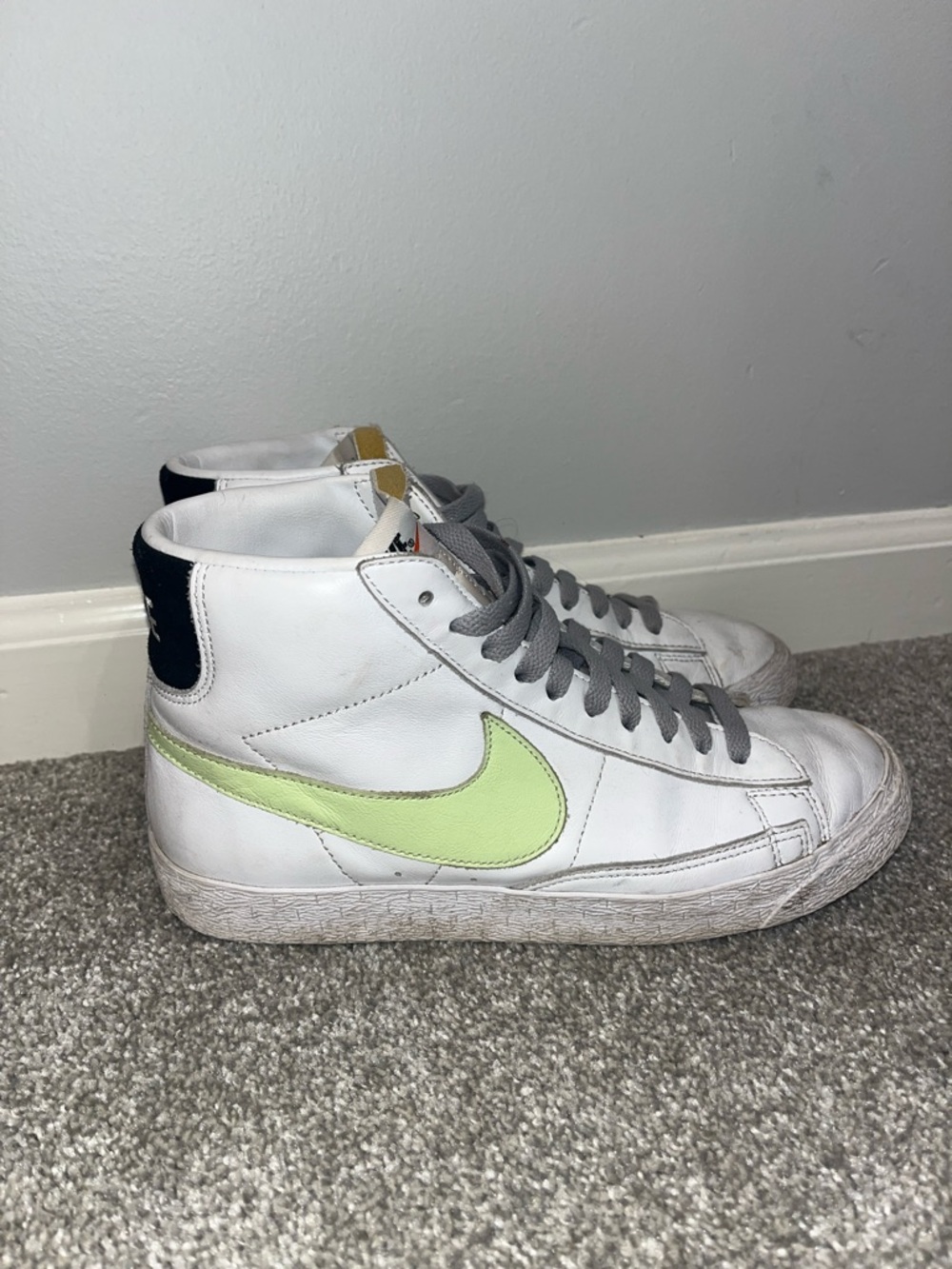 Nike White High-Top Sneakers with Lime Green Swoosh